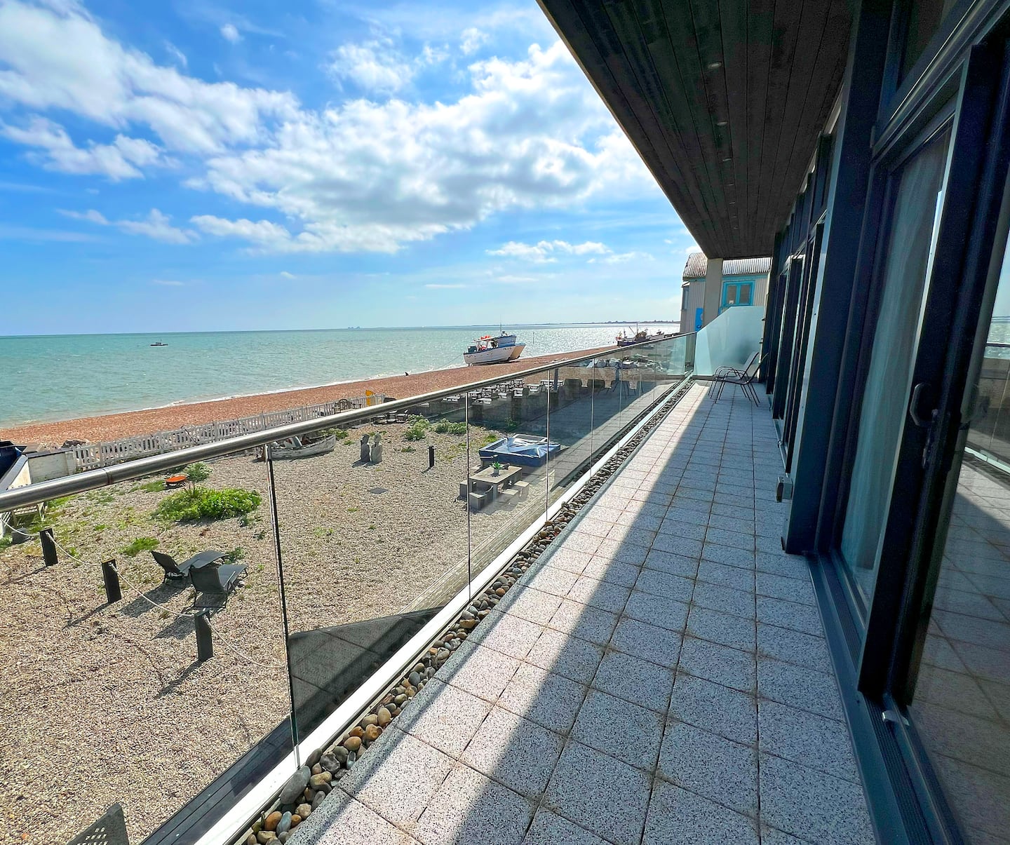 The balcony runs the width of the flat