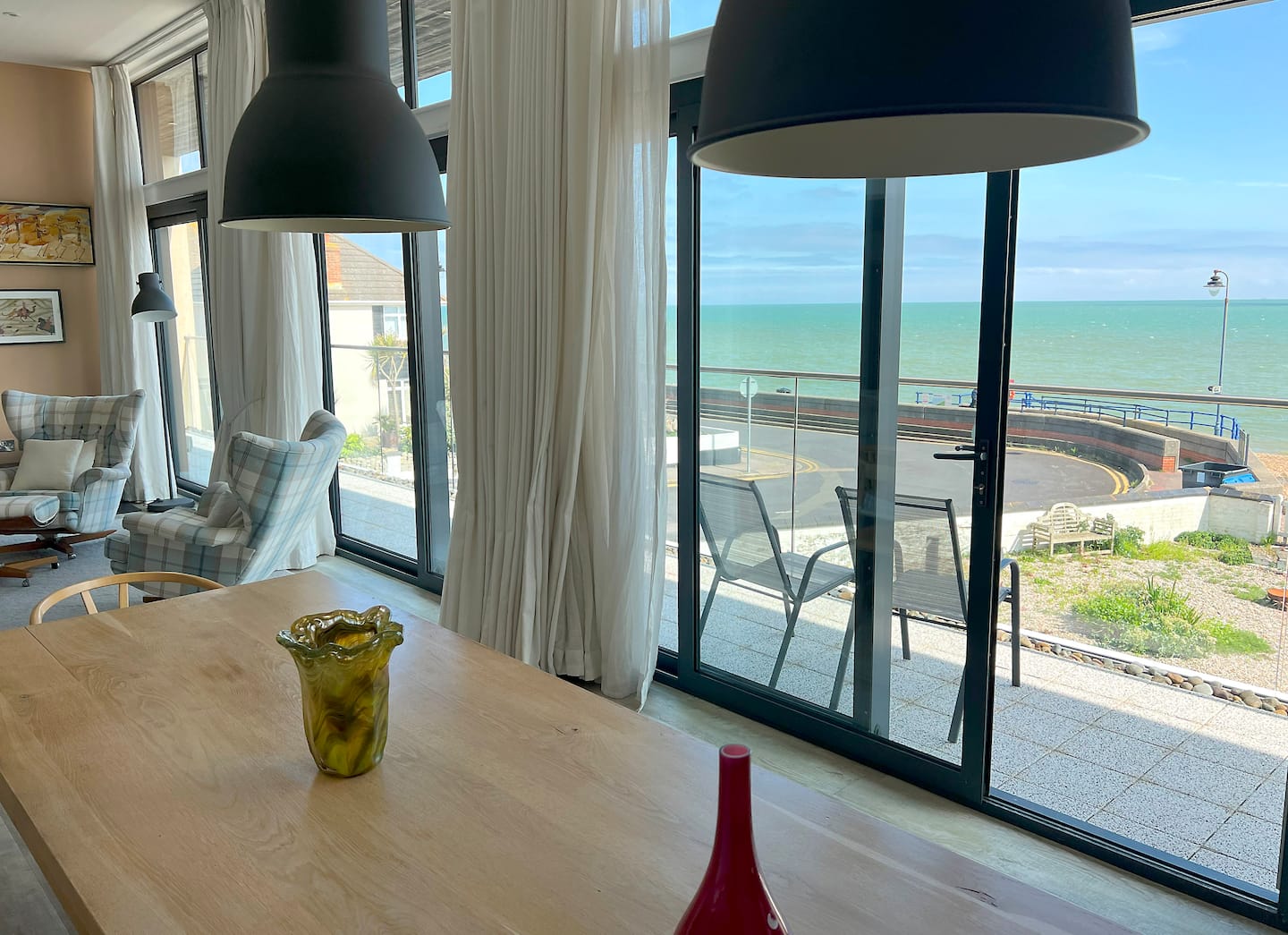 Breakfast, doors open to the balcony